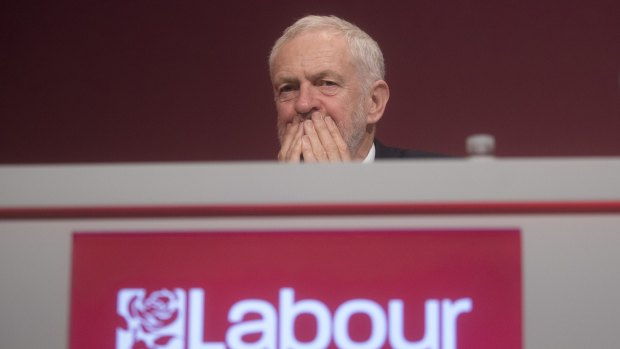 UK Labour leader Jeremy Corbyn listens during the opening speeches at the Labour Party Annual Conference in Brighton on Sunday.