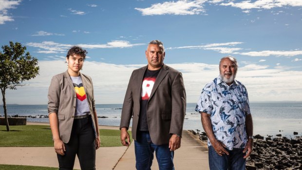 Mark Yettica-Paulson (centre), joint campaign director of Recognise, with his daugter Tavina Yettica-Paulson and his father Reverend Graham Paulson.