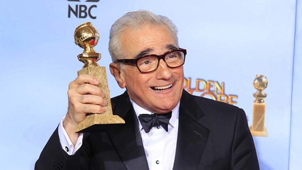 Martin Scorsese with the Golden Globe he won for best director for Hugo earlier this month.
