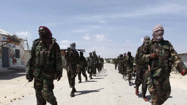 Al Shabab soldiers patrol the streets of southern Mogadishu.