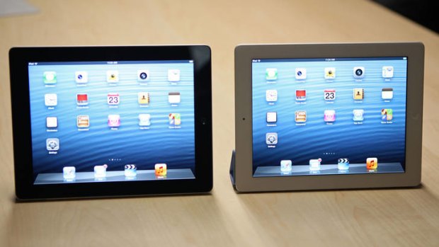 Apple's fourth generation iPad on show during a hands on session.