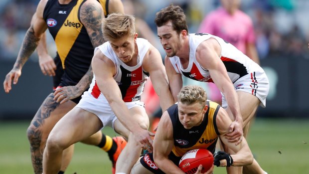 Intent scrutiny: Umpires turned mind-readers during the St Kilda Richmond clash.