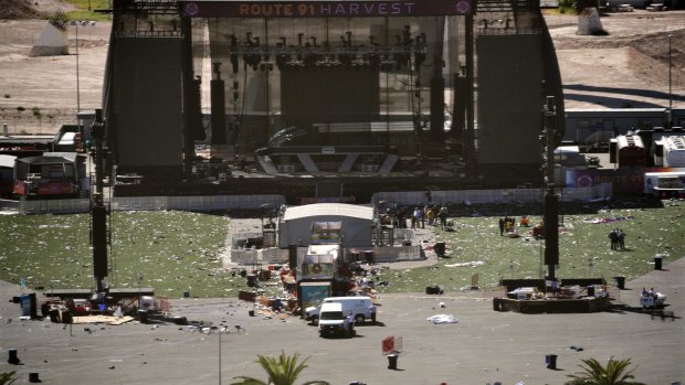 Debris is strewn through the scene of a mass shooting at a music festival in Las Vegas.