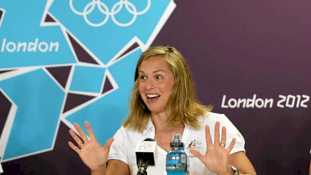 Libby Trickett reacts at a press conference following the London Olympic gold medal victory by Autralia's women's 4x100m freestyle relay team.