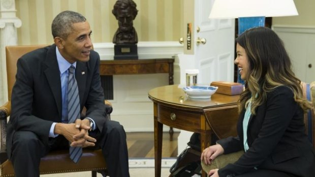 President Obama meets with Ebola survivor Nina Pham at the White House in Washington on Friday, October 24, 2014.