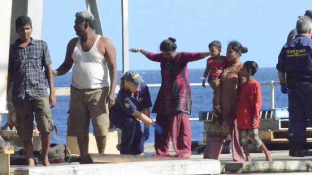 Sri Lankan asylum seekers disembark at Christmas Island.