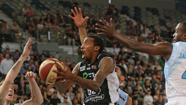 Rookie on the rise: Melbourne United import Jordan McRae finds a way through traffic against the Breakers on Sunday.