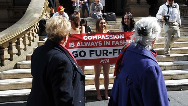 Fur goodness sake: Protesters make a statement at Sydney Town Hall.