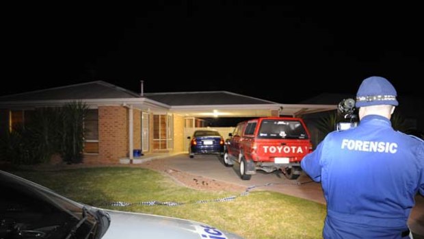The homicide and forensic squads arriving at the Kalimna Drive, Mooroopna, residence early this morning.