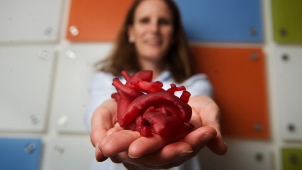 Laura Olivieri, a paediatric cardiologist, displays a heart model created by a 3-D printer.