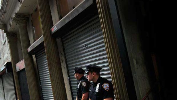 New York police officers guard the site of the proposed Islamic cultural centre near Ground Zero. <i>Picture: Getty</i>