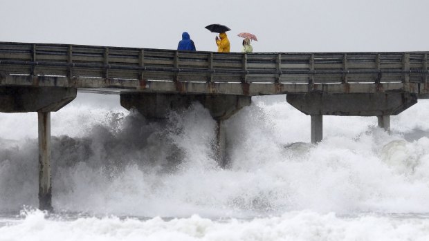 Angry sea: High waves crash under the Ocean Beach Pier as a winter storm brings rain and high winds to San Diego, California.