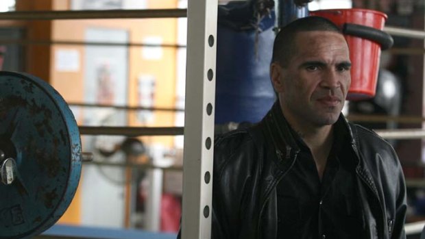 Gloves off ... Anthony Mundine holds a news conference at his Redfern gym yesterday to promote his coming fight with Rigoberto Alvarez.
