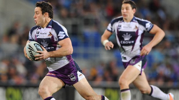 Victory ... Cooper Cronk runs the ball for the Storm. The race to the NRL major premiership is all about learning from previous campaigns.