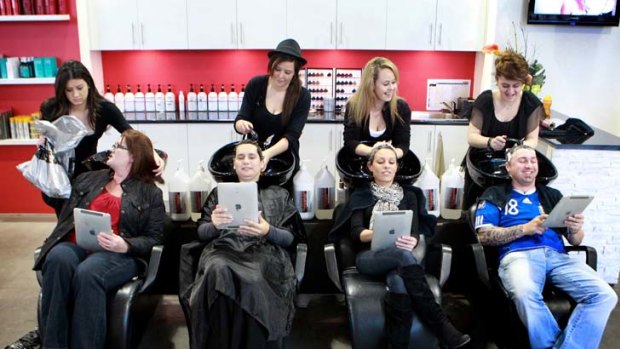 Cutting edge ... Jane Pustahija, Stephanie Pistolic, Christina Adragna and Andrew Sciberras get their hair washed at United Artists Hairdressing.