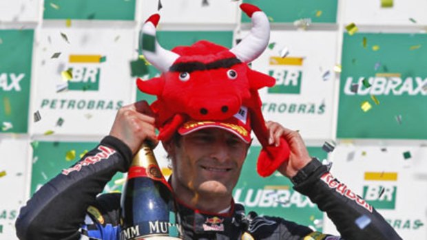 Mark Webber celebrates his second placing in the Brazilian F1 Grand Prix.