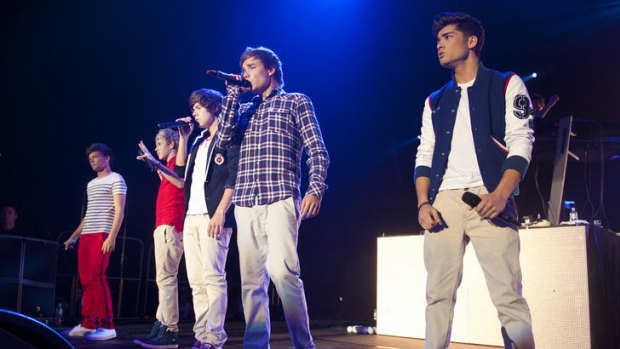 Coming back to Australia ... One Direction during their performance at the Brisbane Convention and Exhibition Centre on April 18.