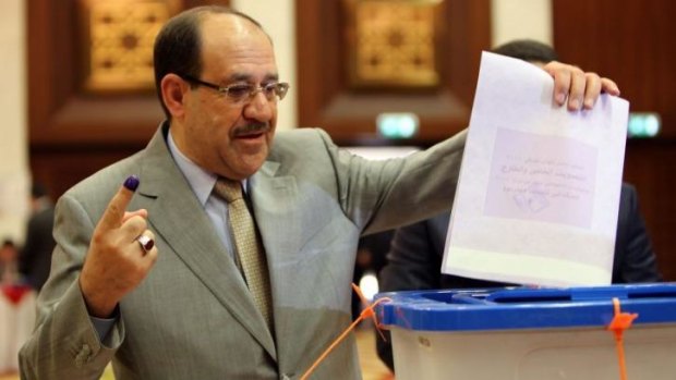 Prime Minister Nouri al-Maliki casts his vote on Wednesday.