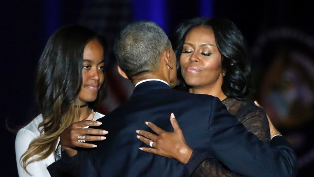 President Barack Obama with wife Michelle and daughter Malia after his presidential farewell address.