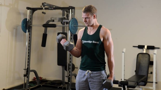 Building for the future: Jake Stringer uses some weights as he prepares for the AFL draft.