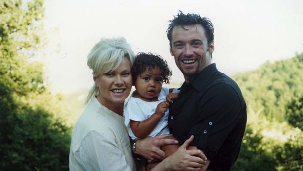 "It's a big deal to take on an older child who's been traumatised" ... Deborra-Lee Furness with her husband Hugh Jackman and their son Oscar.