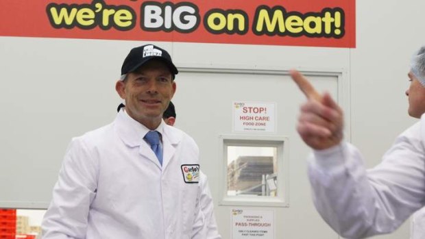 Opposition Leader Tony Abbott visited a meat factory in Sydney to discuss his policy of repealing the carbon tax and skilled migration.
