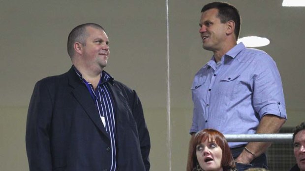 Mining magnate Nathan Tinkler and former Knights player Paul Harrigan.