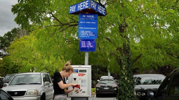 Parking fees in Canberra are on the rise ... Skye Stranger digs deep into her ourse to find the right change.