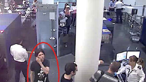Is it him? ... This surveillance image provided by Interpol shows who authorities believe is Luka Rocco Magnotta at a security checkpoint area.