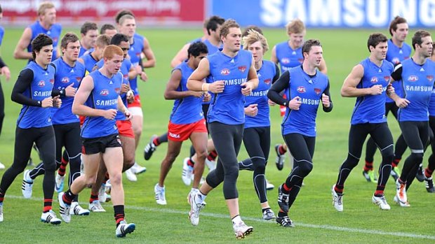 Essendon trains at Windy Hill yesterday.