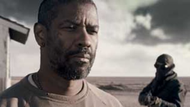 A man of few words...Denzel Washington plays the warrior monk-like Eli, who balances blade against Bible.