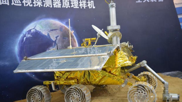 A model of a lunar rover that will explore the moon's surface in an upcoming space mission is seen on display at the China International Industry Fair 2013 in Shanghai.