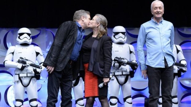 Cast members of the original <i>Star Wars</i>, from left, film Mark Hamill, Carrie Fisher and Anthony Daniels (C-3PO) at the kick-off event of Disney's Star Wars Celebration 2015 at the Anaheim Convention Centre in April.