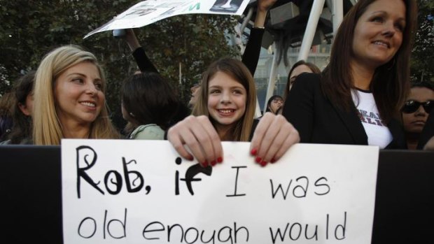 Fan Sarah Shore, 10, waits at the premiere of The Twilight Saga: Breaking Dawn Part 1.