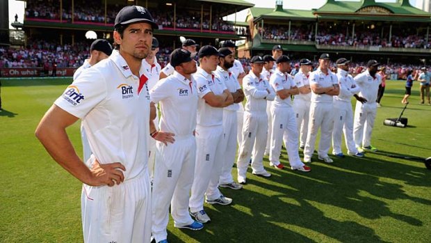 In the firing line: Alastair Cook and his England team suffer through the presentations at the SCG.