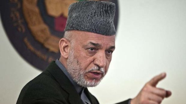 Afghan President Hamid Karzai should be given a chance to implement anti-corruption measures.