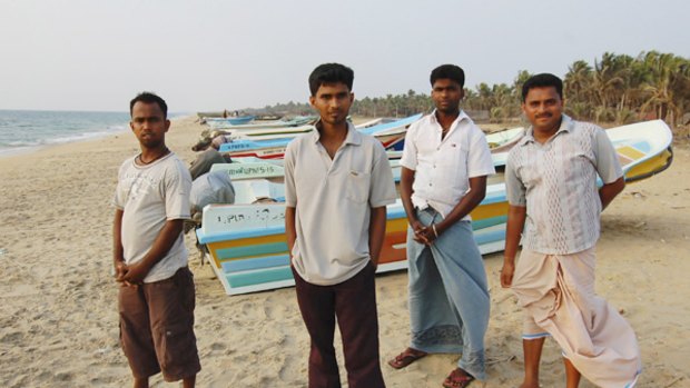 Standing near the point where people-smugglers' boats leave from Andimunai, S. Prabhu (left), Arun Raj, Kethwes Kumar and Kether Vran all say they want to try to come to Australia by boat.