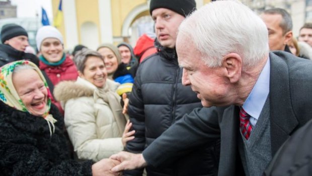 US Senator John McCain in the crowd before addressing the mass rally in Kiev.