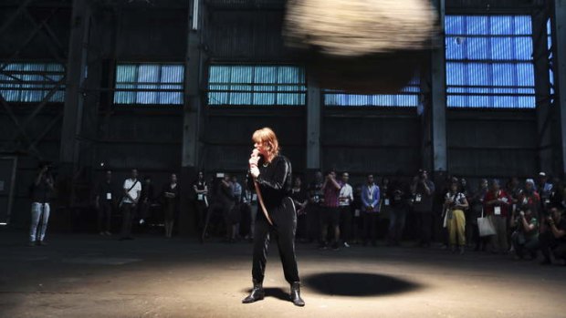 Praised: Tori Wranes performs at Cockatoo Island as a pendulum swings.