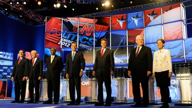 Republican Presidential nomination hopefuls, from left: Senator Rick Santorum, congressman Ron Paul, former CEO of Godfather's Pizza Herman Cain, former Massachusetts Governor Mitt Romney, Texas Governor Rick Perry, former speaker of the house Newt Gingrich and congresswoman Michele Bachmann.
