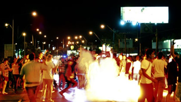 Hundreds of angry revheads take to the streets with flares in protest against the cancellation of the EasterNats race meet at Melbourne’s Calder Park Raceway.