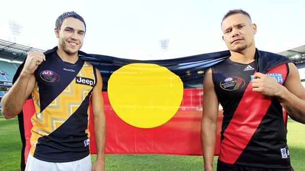 Indigenous footballers Shane Edwards of Richmond (left) and Leroy Jetta of Essendon at the MCG.