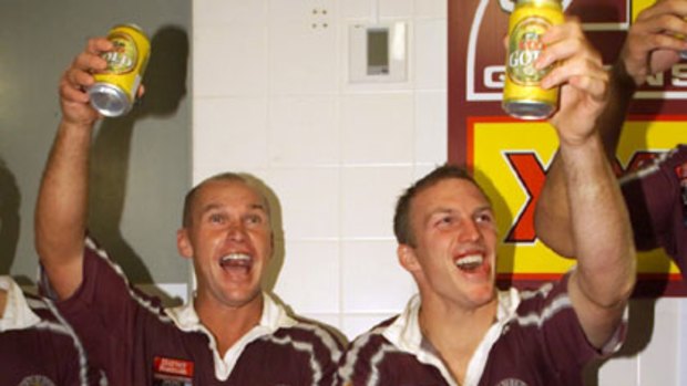Allan Langer and Darren Lockyer celebrate in the dressing room after a State of Origin win.