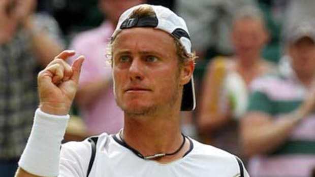 Lleyton Hewitt queries a point in his straight-sets victory.