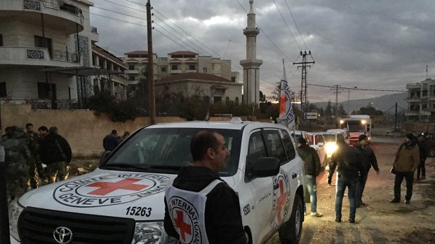 A convoy containing food, medical items, blankets and other materials reaches the town of Madaya. 