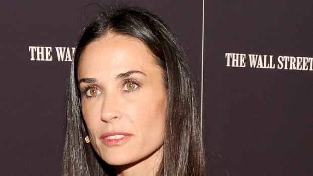 Signs of stress ... Demi Moore allegedly attacks photographer.