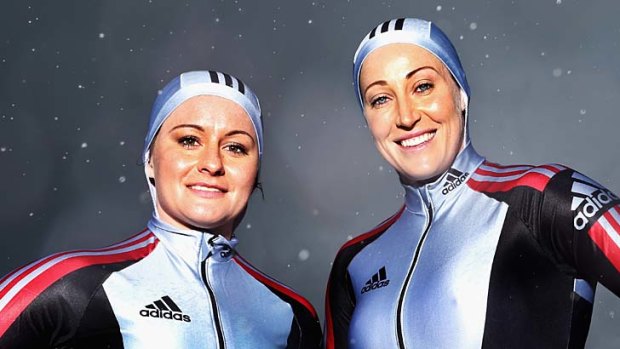 Jana Pittman (R), pictured with  Astrid Radjenovic, joins Paul Narracott as the only Australian to compete in both the summer and winter Olympics.