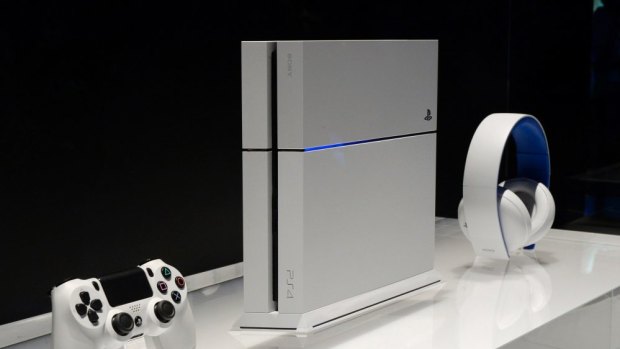 Expanding: Sony displays the newly announced white PlayStation 4 console. The Japanese company hopes to grow a network of streamed services using the popular games and media device as a hub.