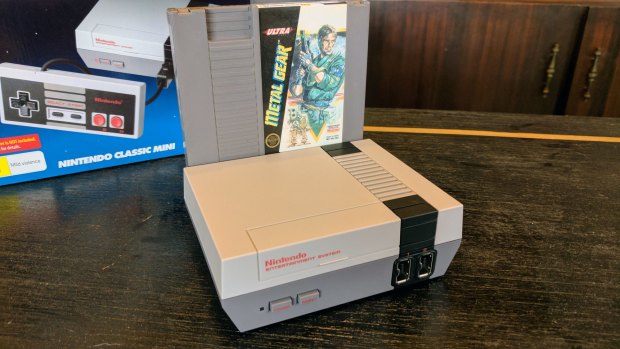 The Mini is around as wide as one original NES cartridge. Sadly, <i>Metal Gear</i> is not included.