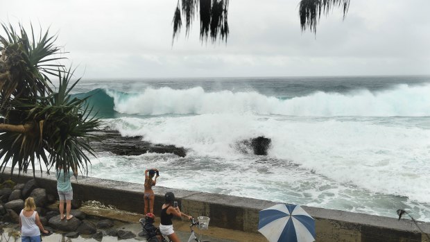 The big swell whipped up by TC Oma mixed with abnormally high tides at Snapper Rocks on the Gold Coast.